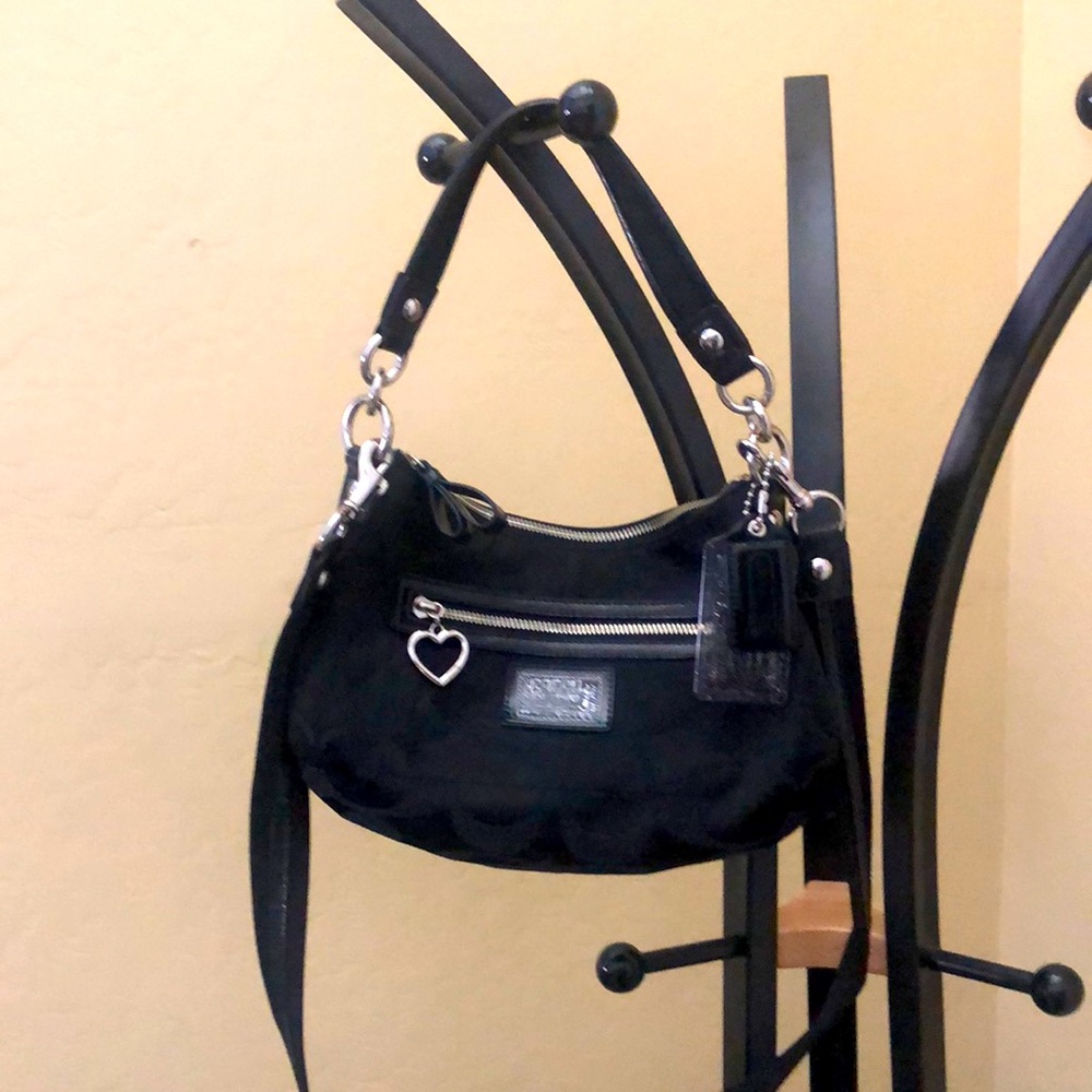 Black Coach crossbody handbag.